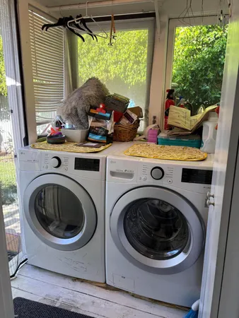 a room with furniture and a fireplace