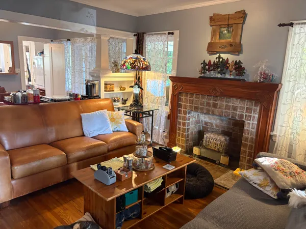 a room with furniture and a flat screen tv