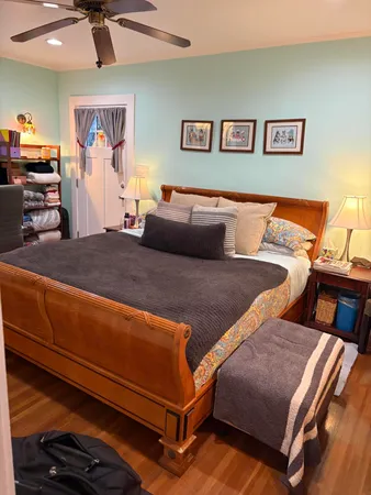 a kitchen with stainless steel appliances a stove a cabinets and potted plant