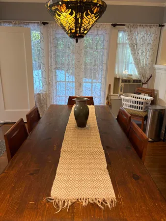 a room with furniture and a flat screen tv