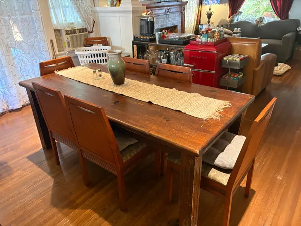 a room with furniture and wooden floor