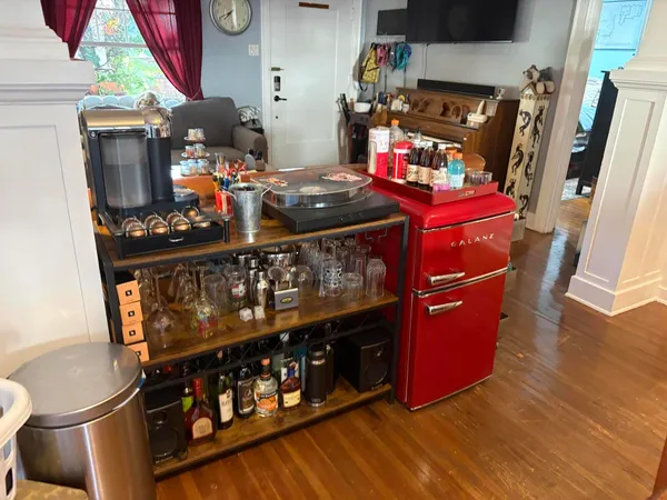 a view of a living room and dining room