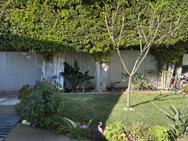 a stove top oven sitting inside of a kitchen