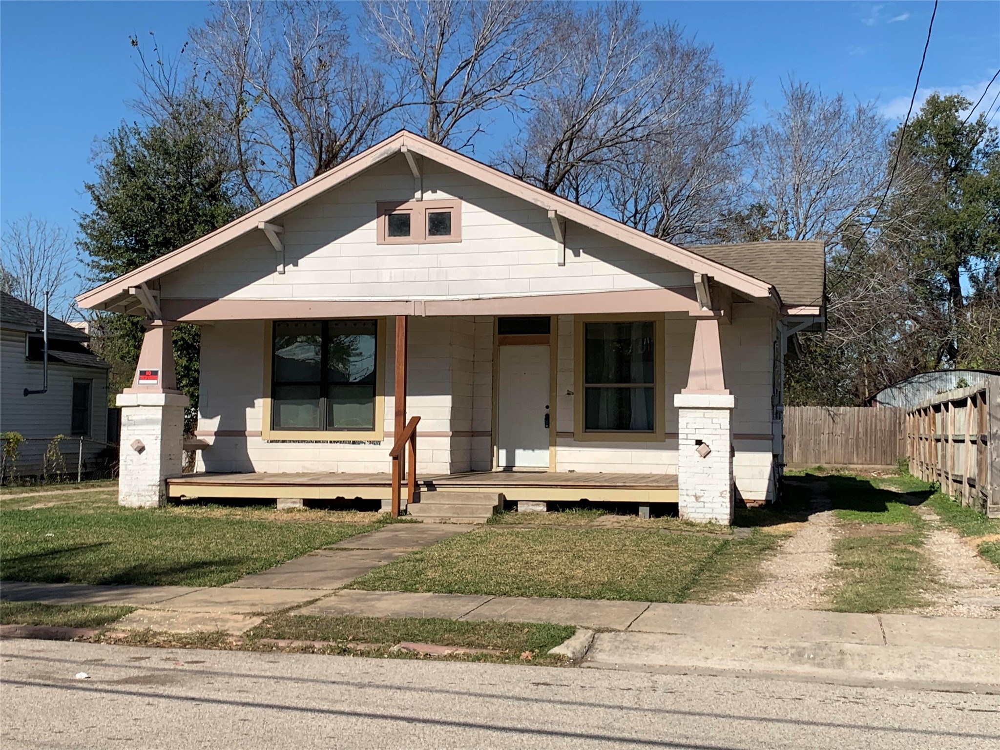 206 Cosmos Street Houston, TX 77009 - Photo 13 of 14 a front view of a house with a yard