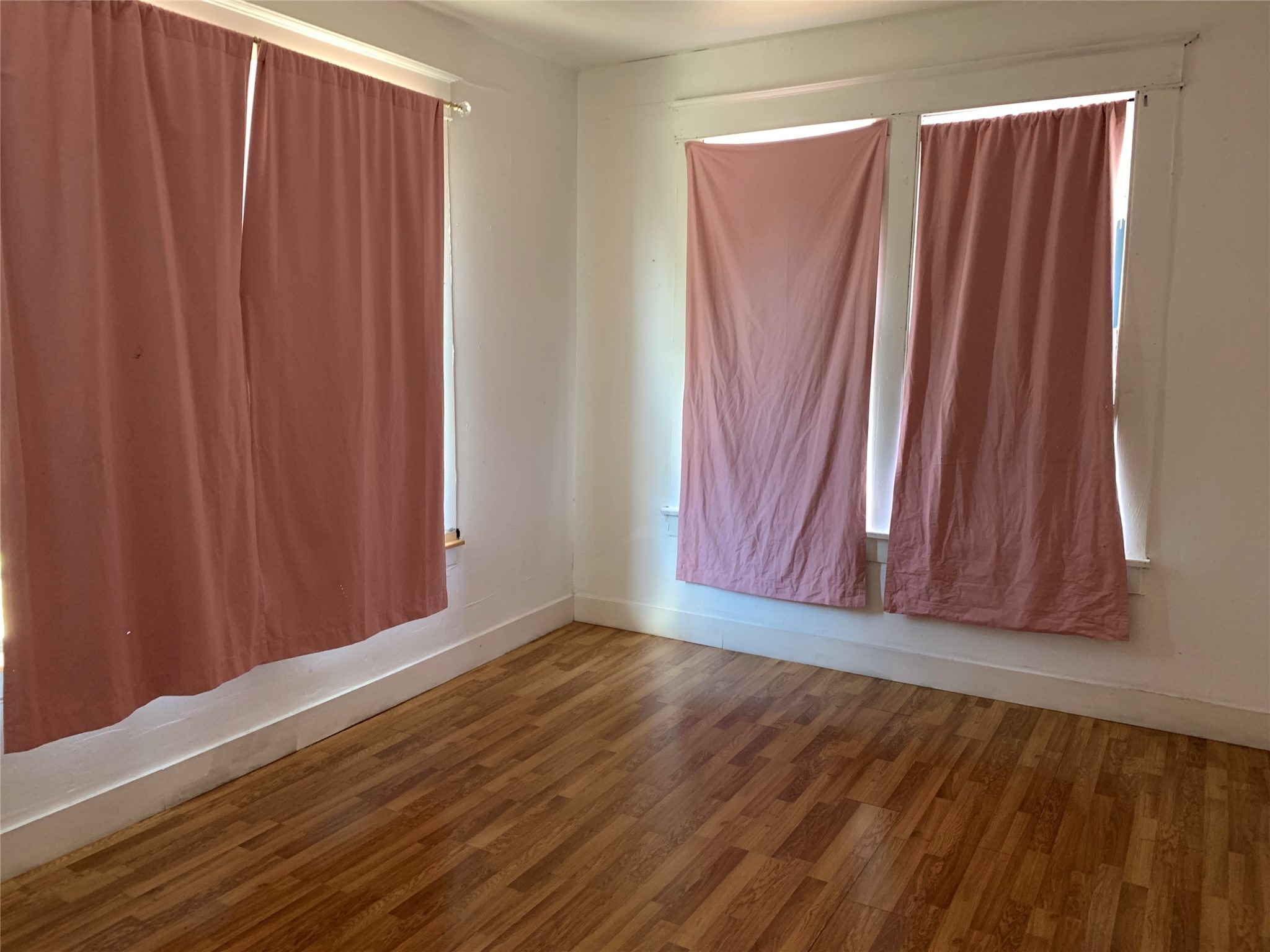 206 Cosmos Street Houston, TX 77009 - Photo 8 of 14 a view of a room with wooden walls