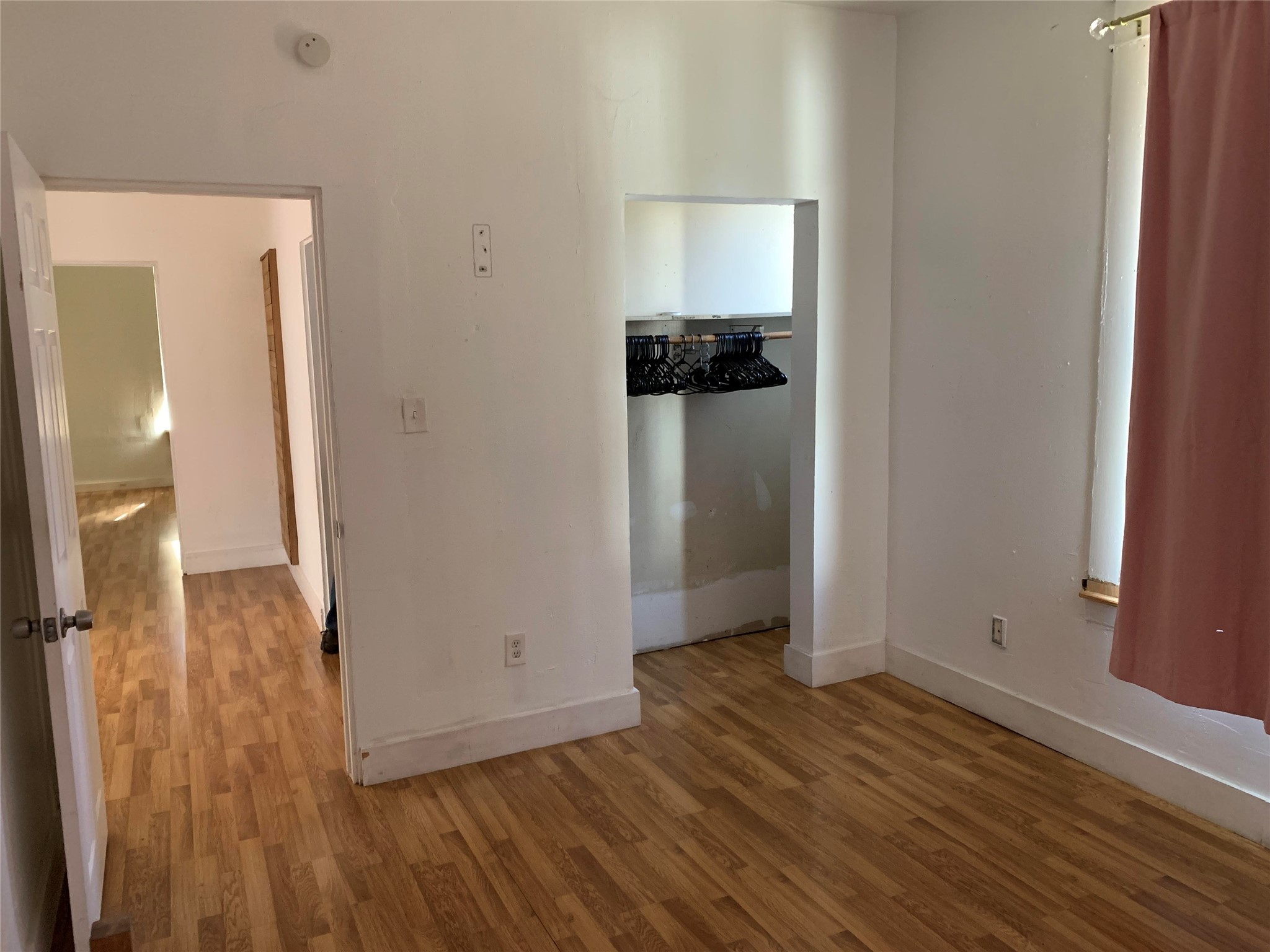 206 Cosmos Street Houston, TX 77009 - Photo 9 of 14 wooden floor in an empty room
