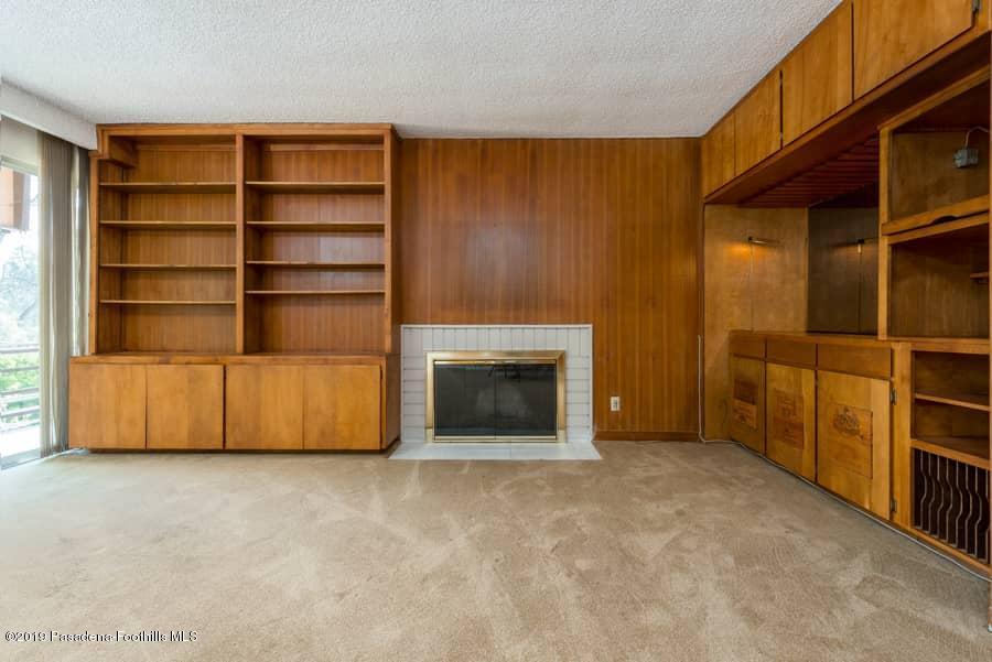 2107 Pinecrest Drive Altadena, CA 91001 - Photo 14 of 37 a view of an empty room with a fireplace