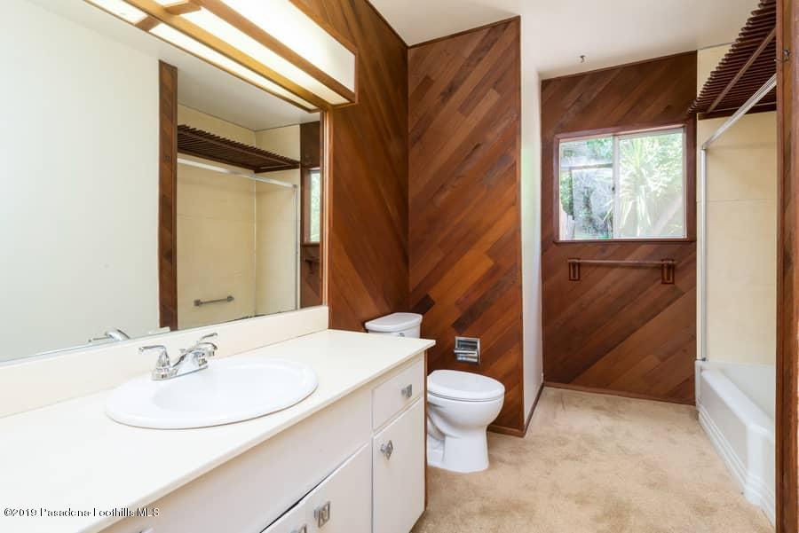 2107 Pinecrest Drive Altadena, CA 91001 - Photo 29 of 37 a bathroom with a sink a toilet and a mirror