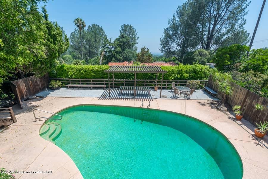 2107 Pinecrest Drive Altadena, CA 91001 - Photo 35 of 37 a view of a swimming pool with a patio