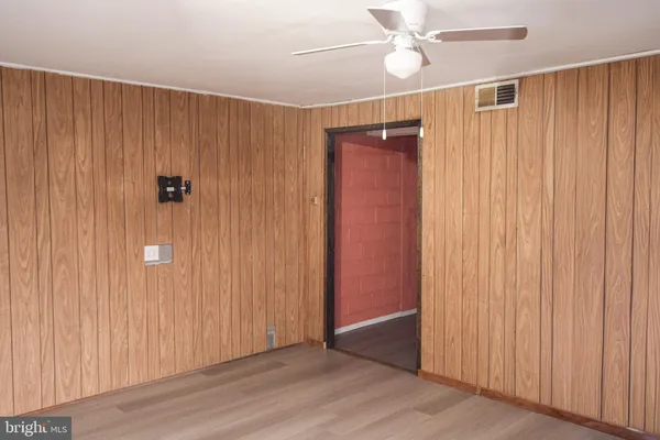 a bathroom with a sink a toilet and vanity