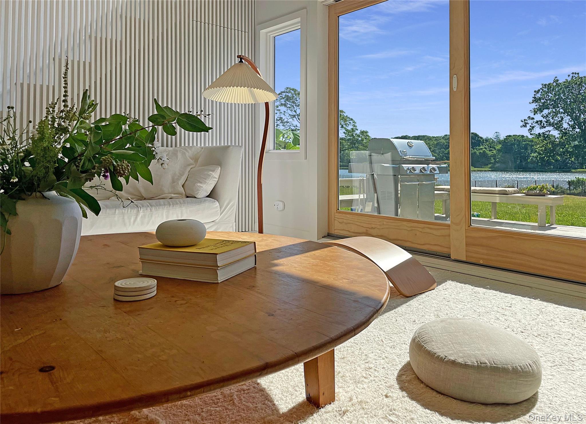 13 Tarkettle Road Shelter Island, NY 11964 - Photo 13 of 23 a room with furniture and a potted plant