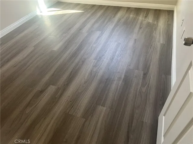 a view of balcony and wooden floor