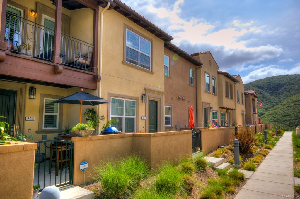 a view of a building with a garden