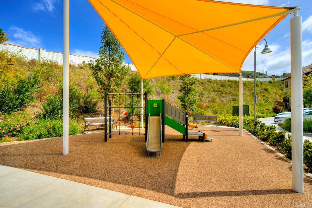 835 Blackstone Drive San Marcos, CA 92078 - Photo 27 of 30 a view of a street with couches and wooden fence
