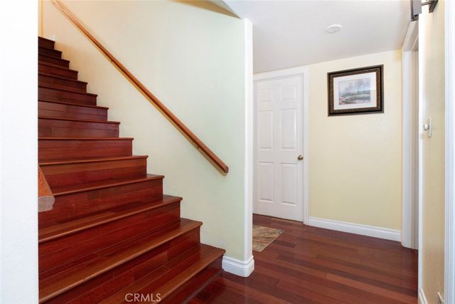 a living room with furniture rug and window