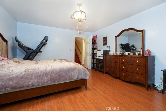 a bathroom with a sink a mirror and a shower