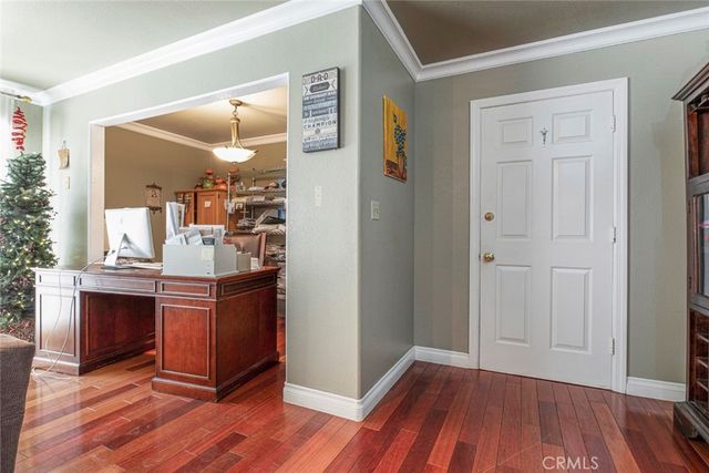 a bathroom with a granite countertop toilet and a shower