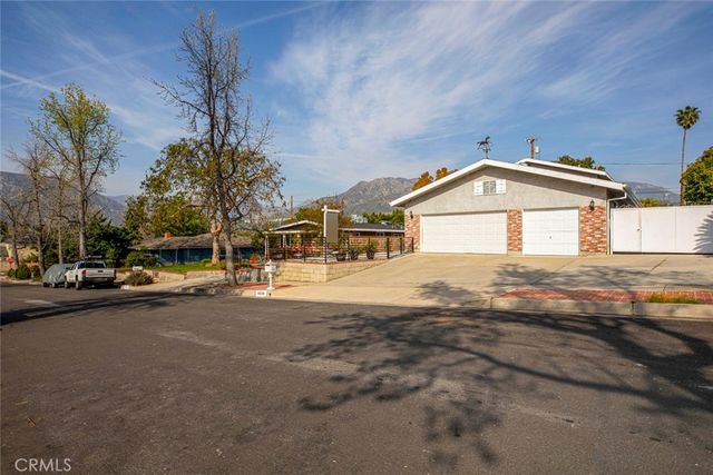a front view of a house with a garage
