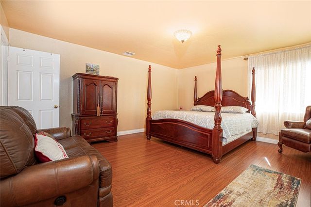 a kitchen with a table and chairs in it