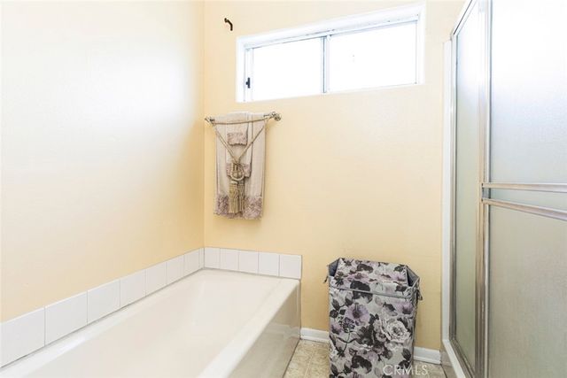 a view of a road with a building in the background