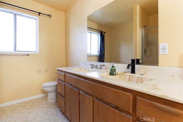 a front view of a house with a garage