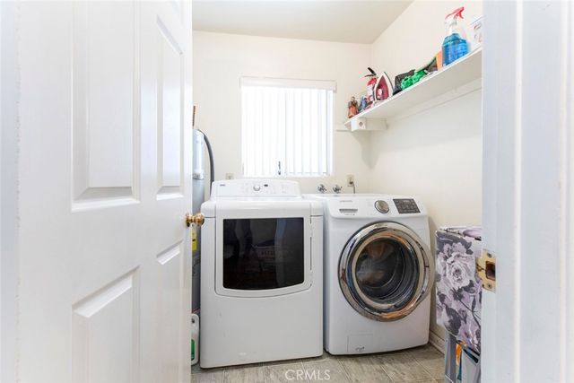 an aerial view of a house with a swimming pool