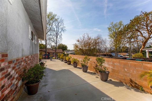 a view of a livingroom with furniture and a flat screen tv