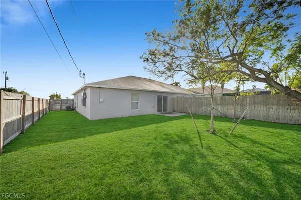 a view of a backyard with a garden
