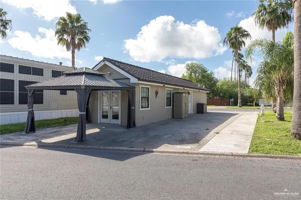 a view of a house with a patio