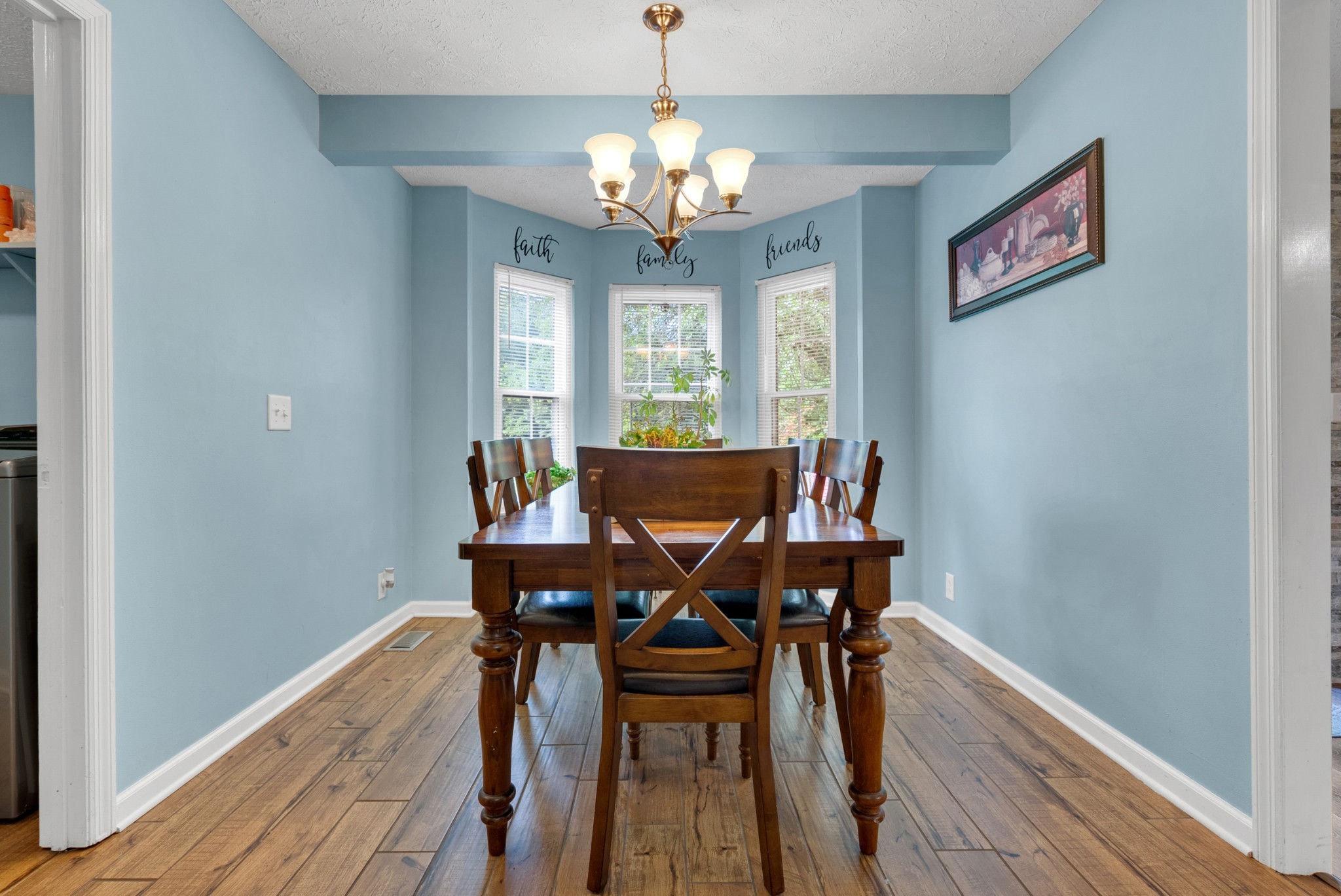 2220 Pleasant View Road Pleasant View, TN 37146 - Photo 12 of 34 a view of a dining room with furniture window and wooden floor