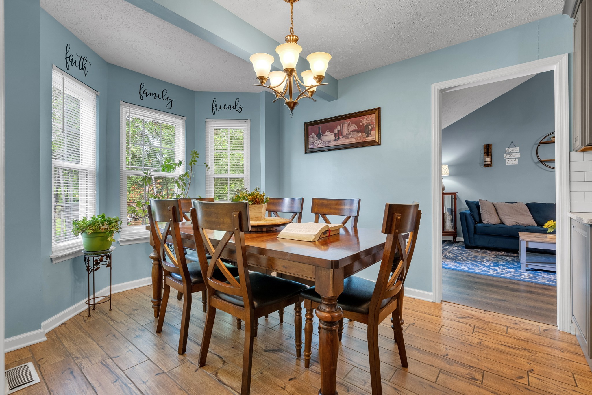 2220 Pleasant View Road Pleasant View, TN 37146 - Photo 13 of 34 a view of a dining room with furniture window and wooden floor