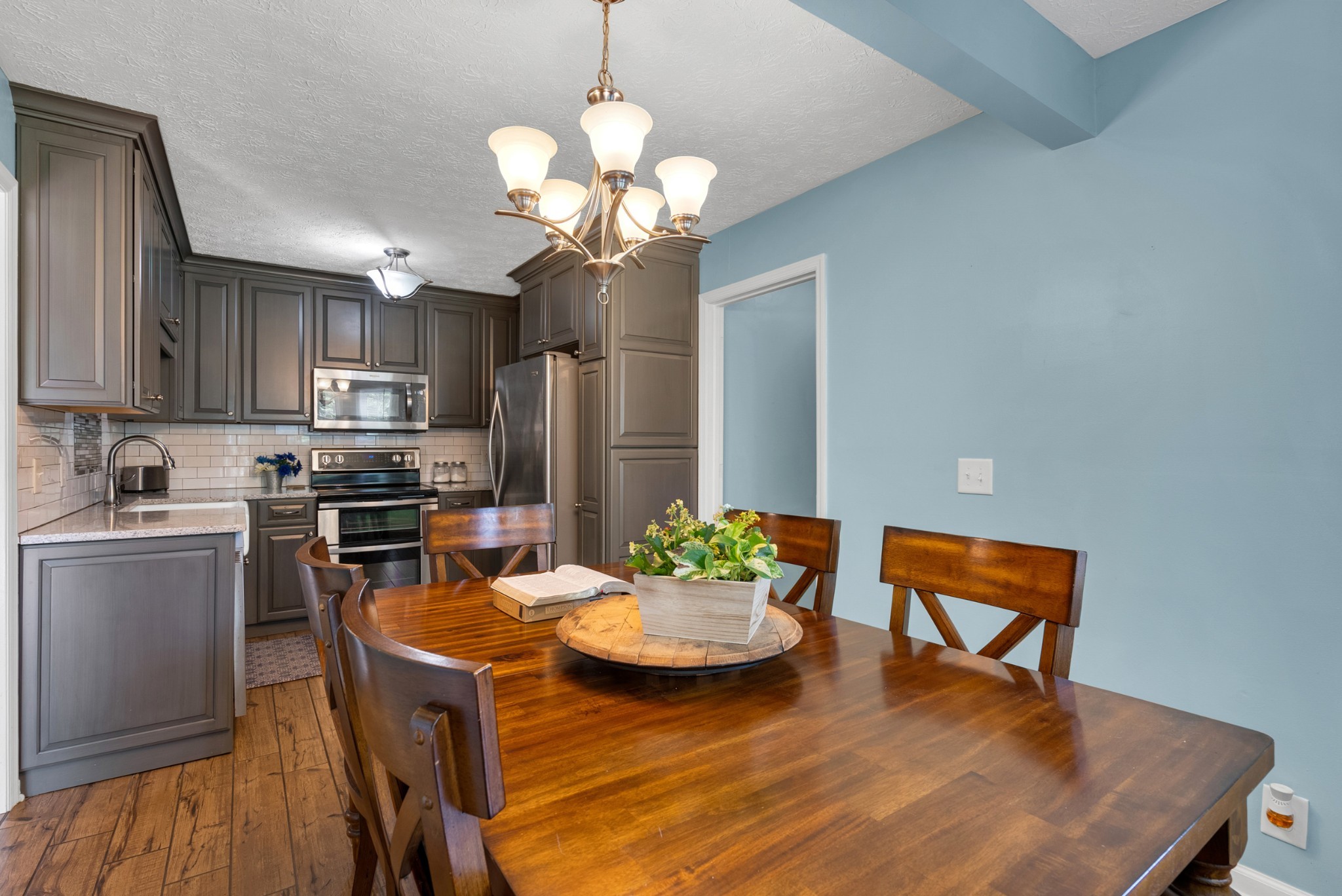 2220 Pleasant View Road Pleasant View, TN 37146 - Photo 15 of 34 a kitchen with a table and chairs in it