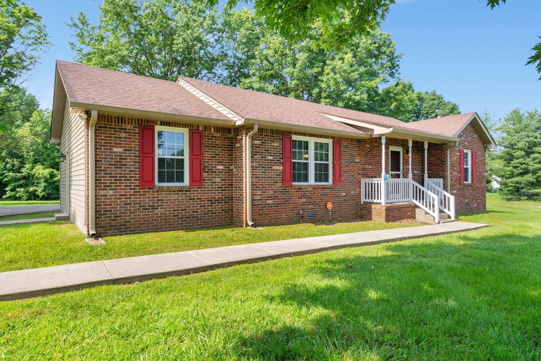 2220 Pleasant View Road Pleasant View, TN 37146 - Photo 2 of 34 a view of a house with a yard and sitting area