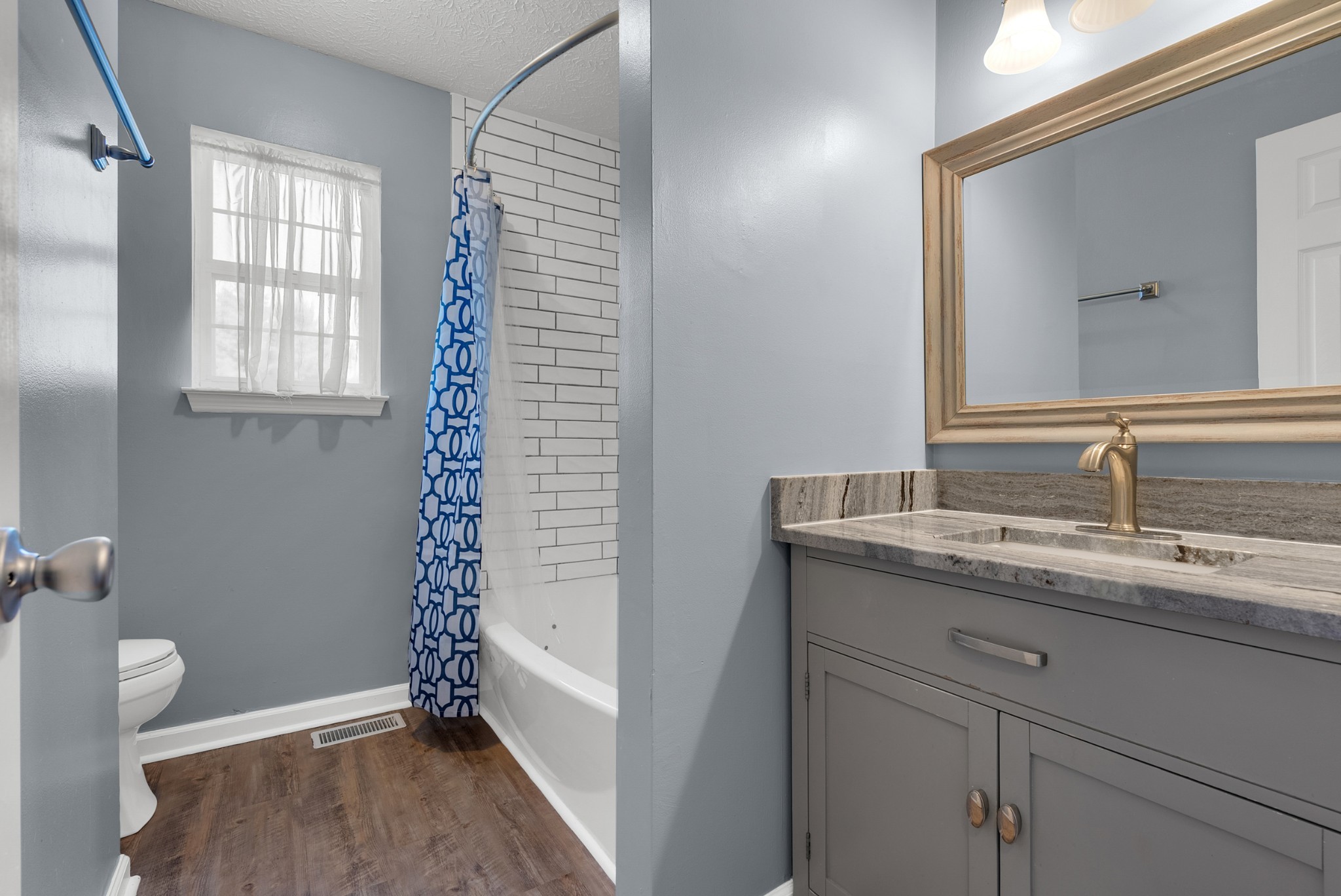 2220 Pleasant View Road Pleasant View, TN 37146 - Photo 23 of 34 a bathroom with a granite countertop sink toilet and shower