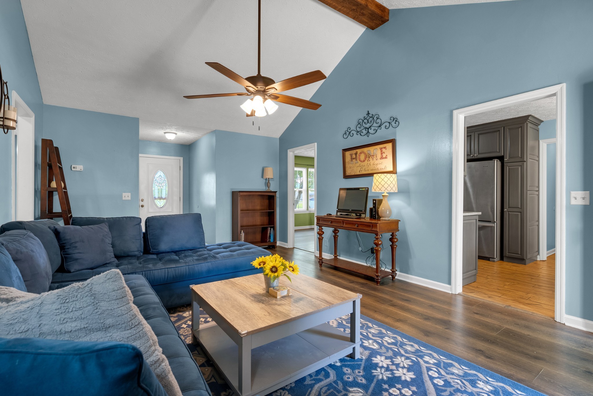 2220 Pleasant View Road Pleasant View, TN 37146 - Photo 9 of 34 a living room with furniture a fireplace and a flat screen tv