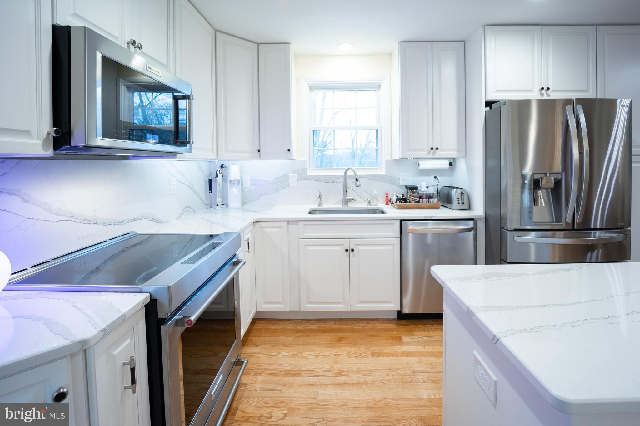 9941 Frederick Road Ellicott City, MD 21042 - Photo 3 of 50 Remodeled Kitchen (2017) with Quartz Counter tops