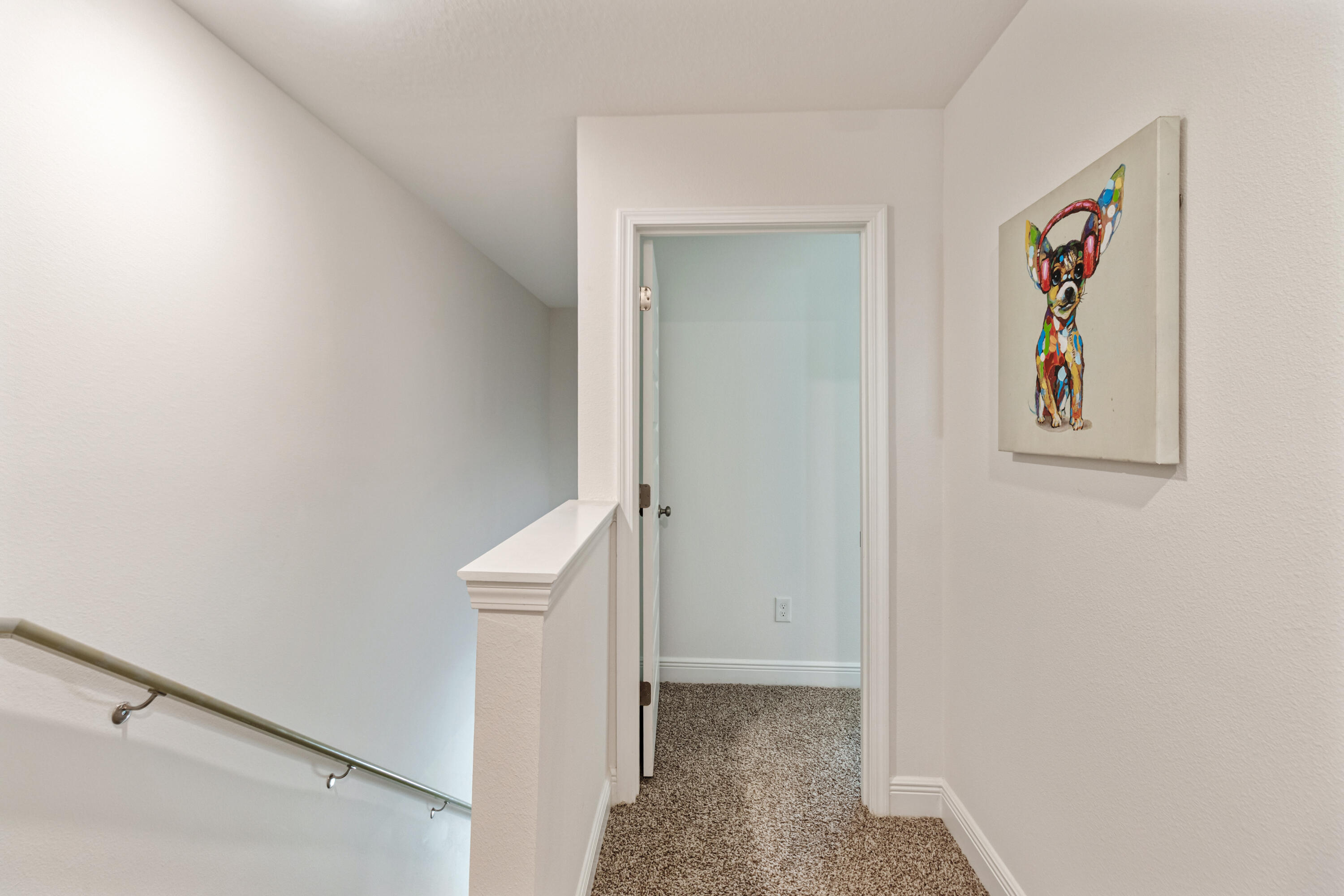 33 Sparrow Avenue Santa Rosa Beach, FL 32459 - Photo 9 of 27 Upstairs hallway into primary bedroom