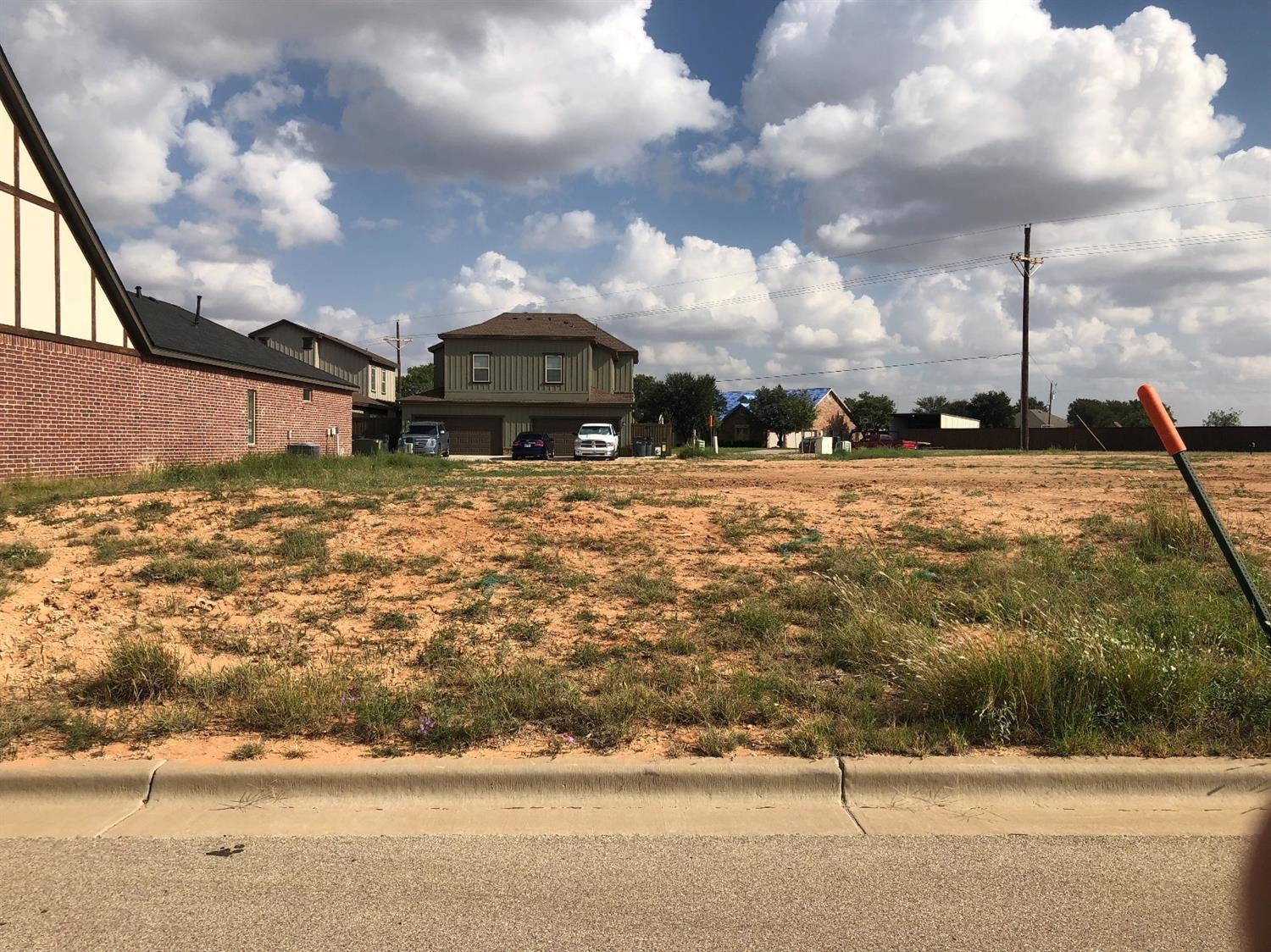 4717 121st Place Lubbock, TX 79424 - Photo 1 of 7 a view of a terrace with a bench