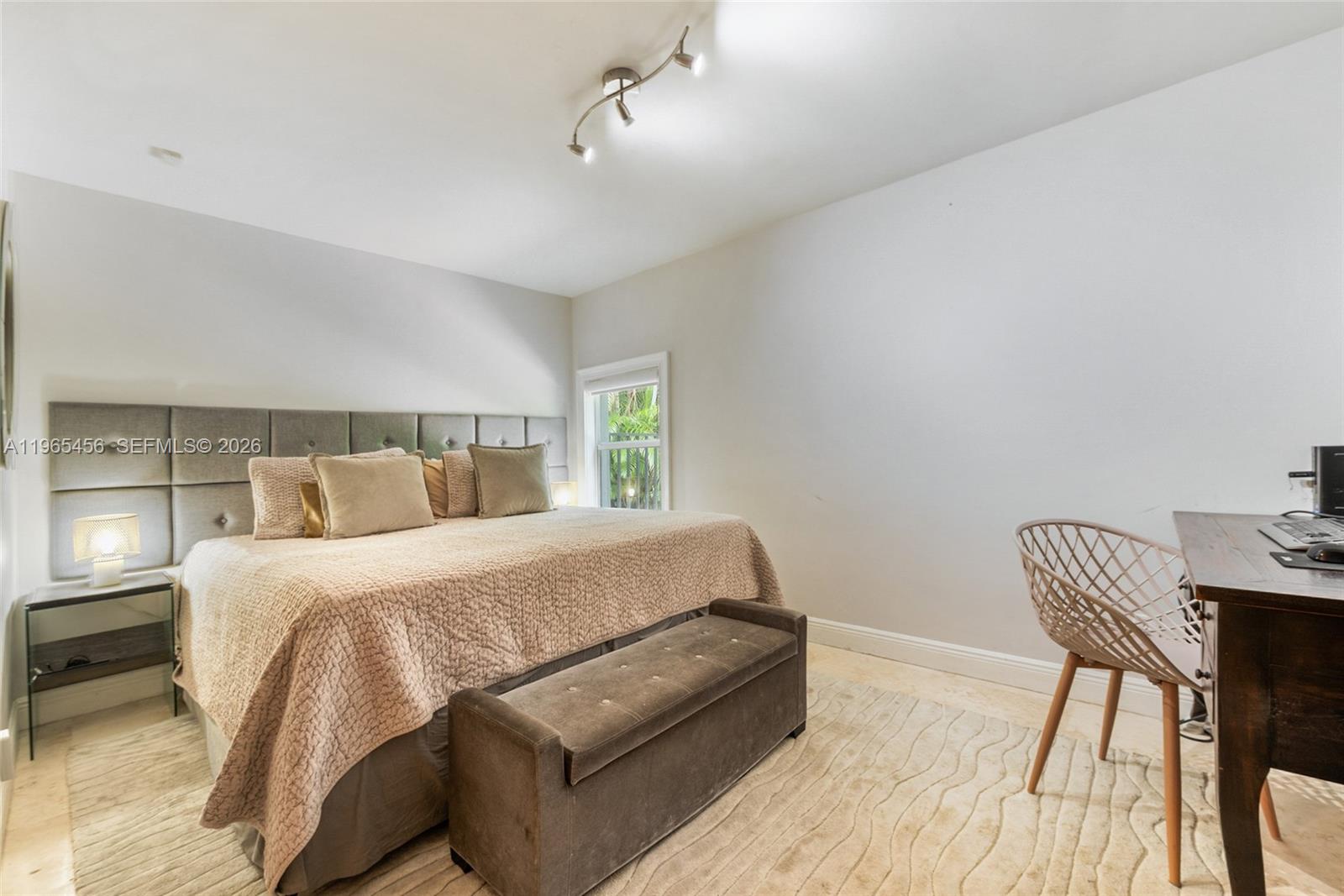 7401 Southwest 117th Street Pinecrest, FL 33156 - Photo 13 of 21 a bedroom with a bed and a desk