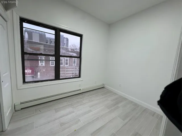 a view of an empty room with window