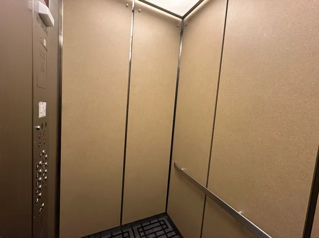 a bathroom with a shower and sink