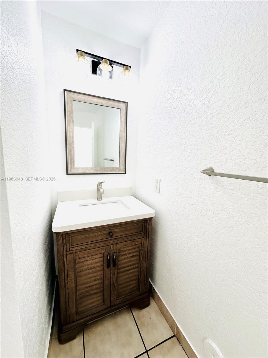 16534 Southwest 97th Terrace, Unit 16534 Miami, FL 33196 - Photo 16 of 38 Guest Bathroom