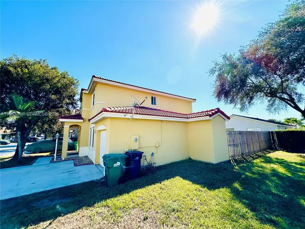 a view of a house with a patio