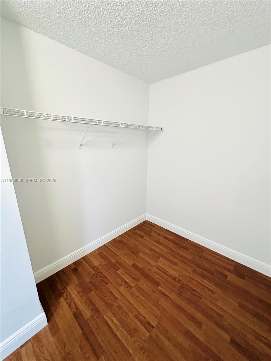 16534 Southwest 97th Terrace, Unit 16534 Miami, FL 33196 - Photo 34 of 38 Master Bedroom Walk-In Closet