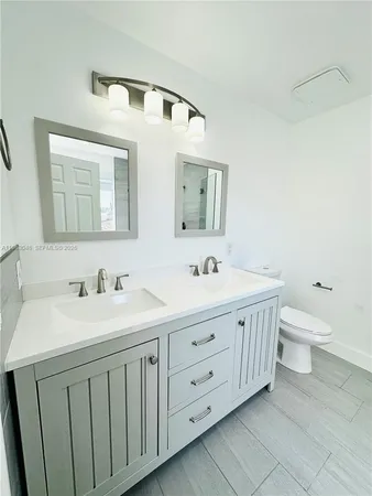 a bathroom with a bathtub and window