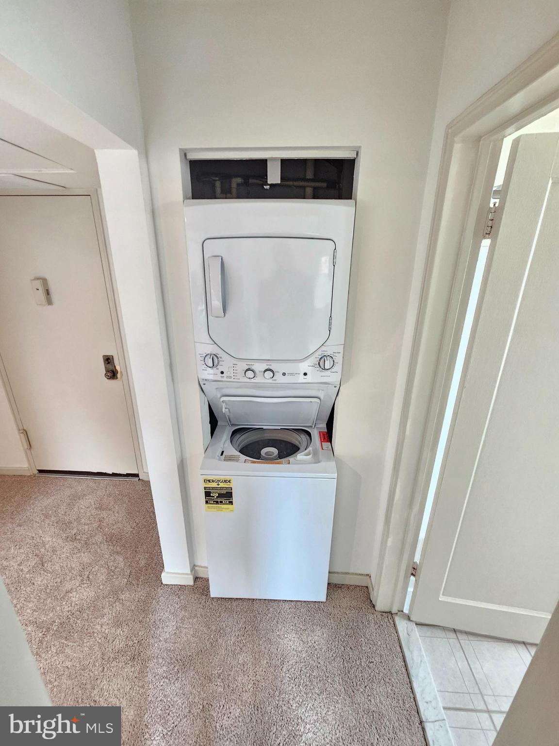 2205 Washington Avenue, Unit 201 Silver Spring, MD 20910 - Photo 9 of 20 a utility room with dryer and washer