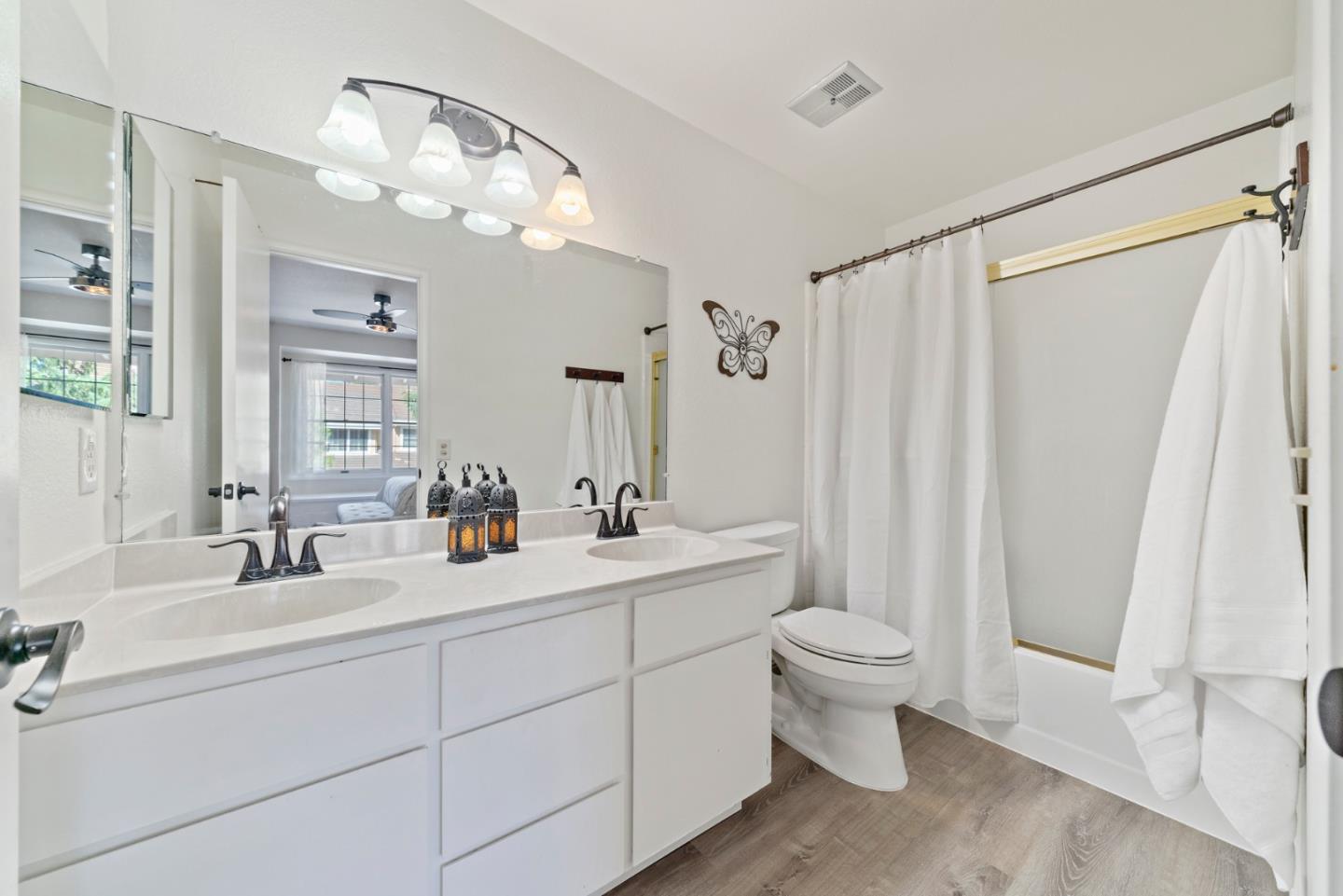 145 Redding Road Campbell, CA 95008 - Photo 16 of 22 a bathroom with a double vanity sink mirror and toilet