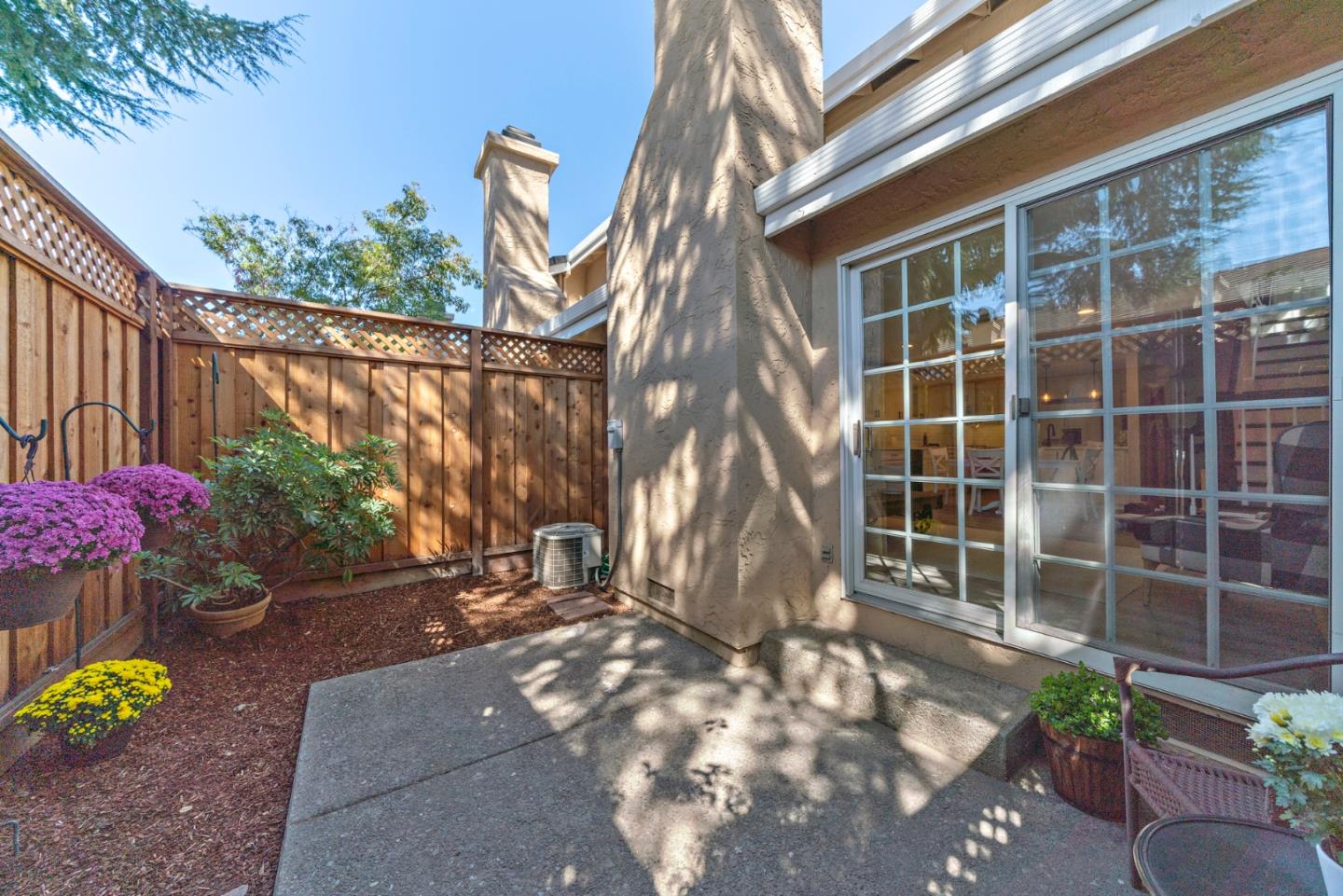 145 Redding Road Campbell, CA 95008 - Photo 21 of 22 a view of a house with a yard and sitting area