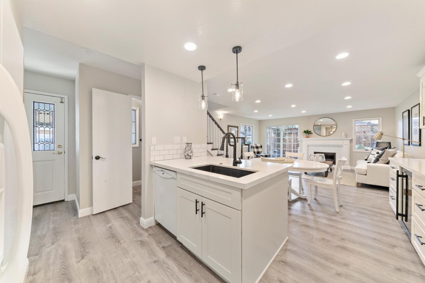 145 Redding Road Campbell, CA 95008 - Photo 5 of 22 a kitchen with a sink and wooden floor