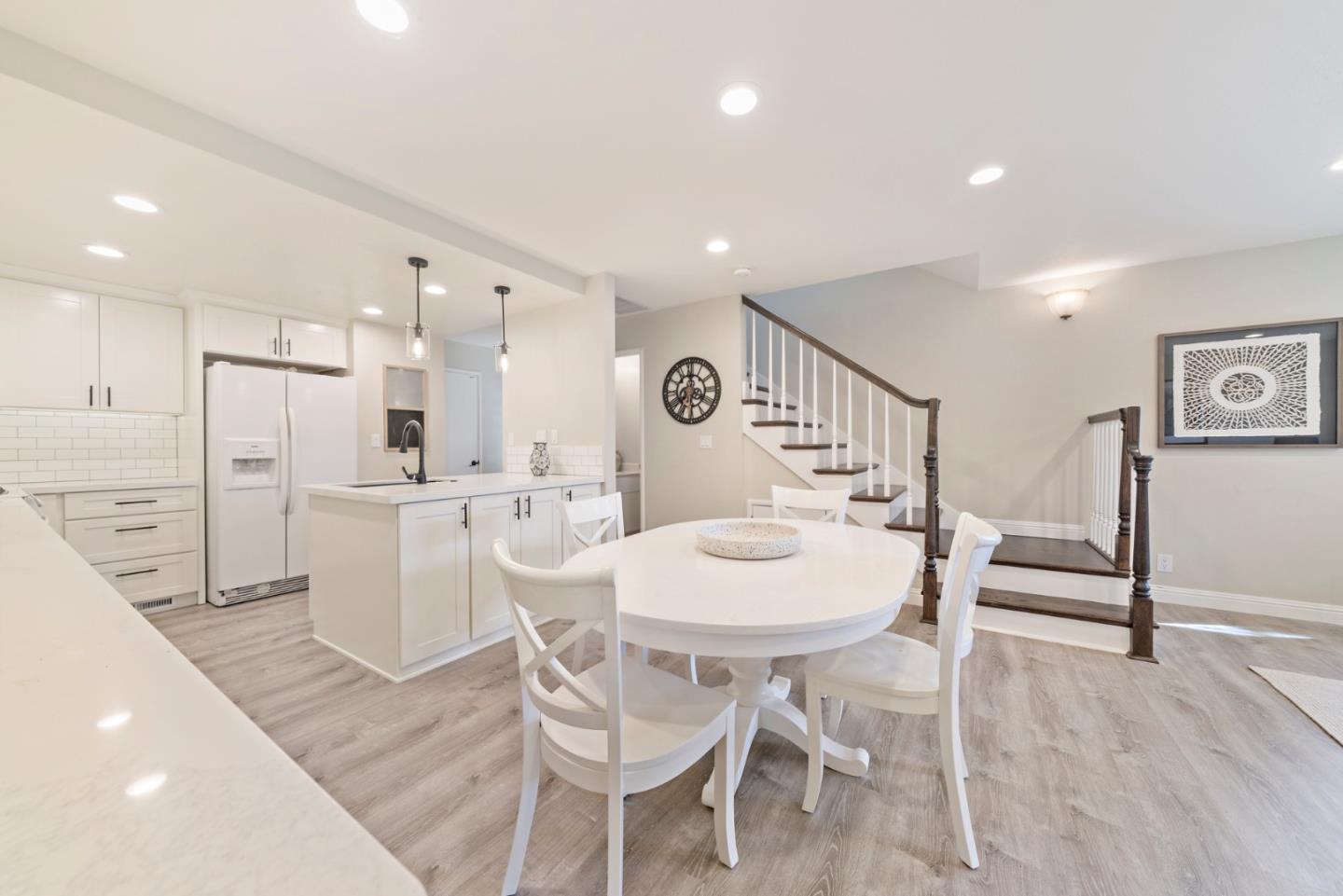 145 Redding Road Campbell, CA 95008 - Photo 6 of 22 a large kitchen with a table and chairs